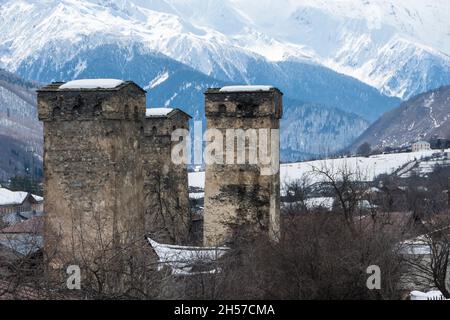 The Svan tower houses of Mestia in wintertime, Svaneti Region, Georgia, Caucasus Mountains Stock Photo