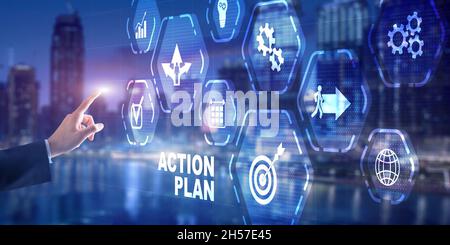 Man is drawing on virtual screen. Action plan concept. Stock Photo
