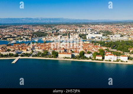 Aerial shot of Zadar old town, famous tourist attraction in Croatia. Waterfront aerial summer view, Dalmatia region of Croatia. Drone. Stock Photo