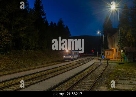 Railway station in Ostruzna village in Jeseniky mountains in autumn night Stock Photo