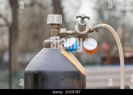 Carbon dioxide cylinder with gearbox industrial gas bottle system. Stock Photo