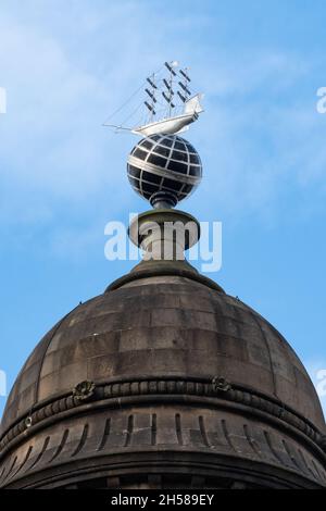 Merchants House of Glasgow, George Square - close up of ship on top of globe on the roof - Glasgow, Scotland, UK Stock Photo