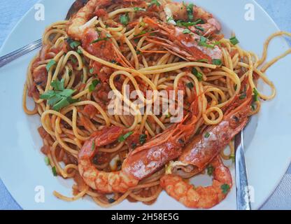 delicious shrimps with spaghetti - traditional greek mediterranean seafood Stock Photo