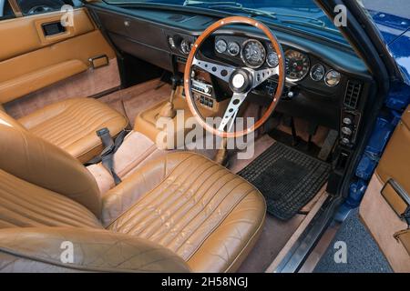 Interior shot with steering wheel and dashboard of an Aston Martin DBS Stock Photo