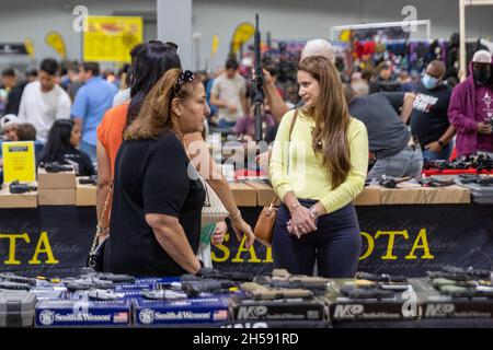 Miami, USA. 07th Nov, 2021. Florida Gun Shows, the largest gun show promoter in Miami, Florida on November 7, 2021. New, used & Antique firearms, ammunition, shooting supplies, knives, Shooting accessories, Scopes, Clips, re-loading supplies, Holsters, Carry Cases, Range Bags, Hunting gear, Concealment products, Concealment Furniture, Gun apparel. (Photo by Yaroslav Sabitov/YES Market Media/Sipa USA) Credit: Sipa USA/Alamy Live News Stock Photo