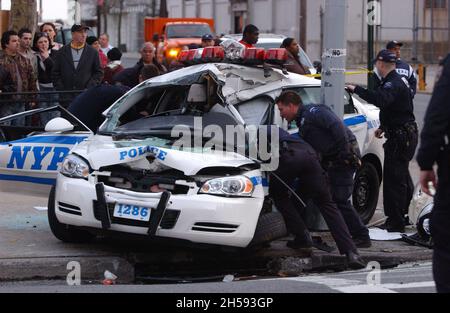 Bklyn, Ny, USA. 7th Nov, 2021. A police cruiser, chasing a stolen car, hit a light pole on Surf Ave. and 25 th Street in Coney Island Brooklyn.April 5, 2008 (Credit Image: © C. Neil Decrescenzo/ZUMA Press Wire) Stock Photo