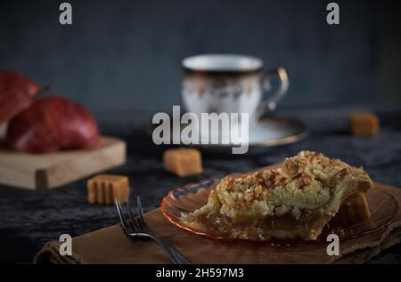 Caramel apple crumb pie with cup of coffee Stock Photo