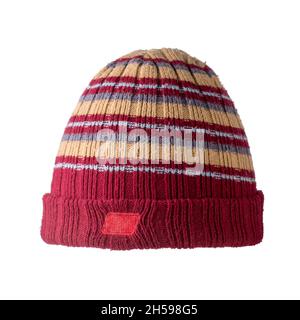 colorful winter cap isolated on white background, closeup of maroon and beige color woolen beanie for cold weather Stock Photo