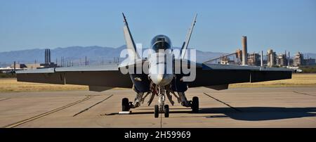 Tucson, USA - November 6, 2021: A U.S. Navy FA-18 Hornet fighter jet prepares for take-off on the runway at Davis-Monthan Air Force Base Stock Photo