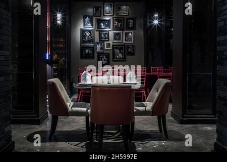 Bangkok, Thailand - Feb 16, 2020 : Interior of retro style restaurant with tables and chairs at shanghai mansion bangkok in yaowarat Rd. Stock Photo