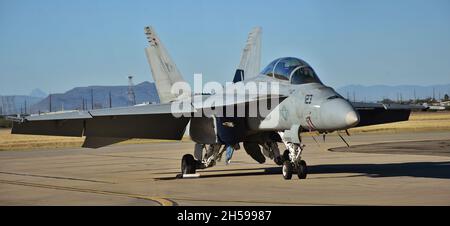 Tucson, USA - November 6, 2021: A U.S. Navy FA-18 Hornet fighter jet prepares for take-off on the runway at Davis-Monthan Air Force Base Stock Photo