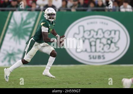 Tampa, FL, USA. 6th Nov, 2021. South Florida Bulls quarterback Timmy McClain (9) looks for an open receiver while scrambling during the game between the Houston Cougars and the South Florida Bulls at Raymond James Stadium in Tampa, FL. (Photo by Peter Joneleit). Credit: csm/Alamy Live News Stock Photo