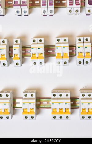Electrical Circuit Breakers. RCD circuit breaker board with many switches. Circuit for the lighting. Electrical circuit breaker switch panel Stock Photo
