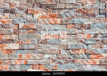 Close up of a stone wall texture, bricks with a pattern Stock Photo