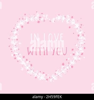 Vector hand drawn illustration of text IN LOVE WITH YOU and floral frame in the shape of a heart on pink background. Stock Vector