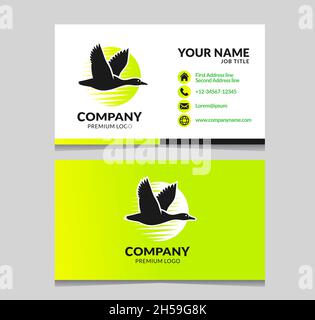 duck flying logo with business card design vector Stock Vector