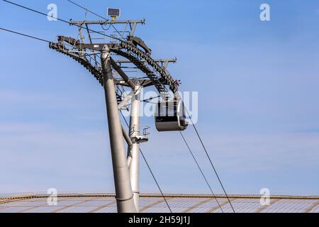 Cable car cabins against amazing sky and clouds. Cableway Stock Photo ...