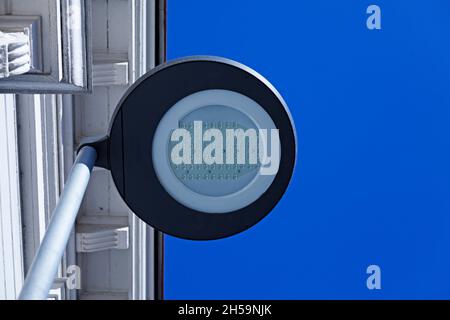 street lamp from below with led light against clear blue sky Stock Photo