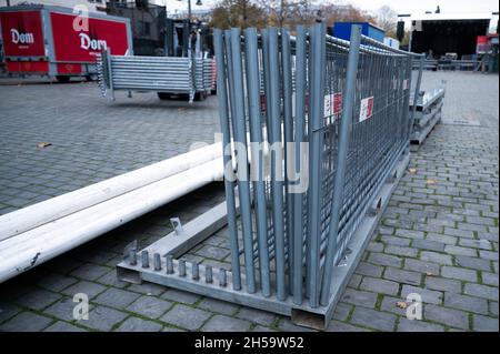 Cologne, Germany. 08th Nov, 2021. Barrier fences stand during construction work for the carnival kick-off under Corona conditions on 11.11. on the Heumarkt. Thursday is traditionally the start of the fifth season in the carnival strongholds. Credit: Federico Gambarini/dpa/Alamy Live News Stock Photo