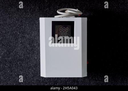 Dual-circuit gas boiler. Gas boiler for home heating. Wall double-bithermic boiler for heating and hot water Stock Photo