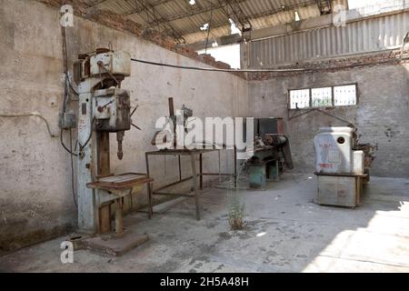 Poligoni Enterprises.  An ex-bunker factory outside of Sarande in village of Vrion. Stock Photo