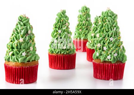 Christmas tree cupcakes isolated on white background Stock Photo