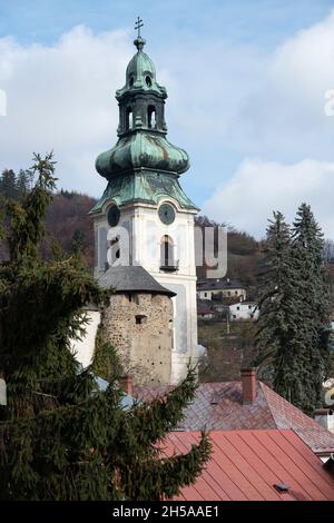 Tower of a church, which is a part of the Old Castle in the city Banska Stiavnica in Slovakia, part of the UNESCO heritage site Stock Photo