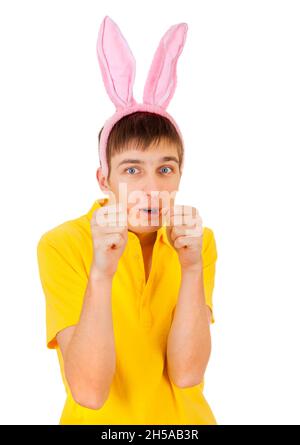 Young Man with Bunny Ears threaten with a Fist Isolated on the White Background Stock Photo