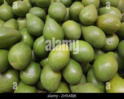 Avocados, in a market, full screen Stock Photo