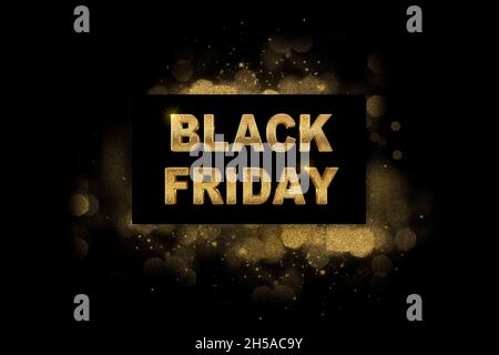 Black Friday Sale banner. 3D gold lettering. Sign with gold glitter bokeh over black background with copy space. For your shopping promotion or busine Stock Photo