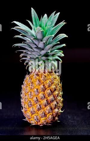 close up ripe pineapple on table Stock Photo