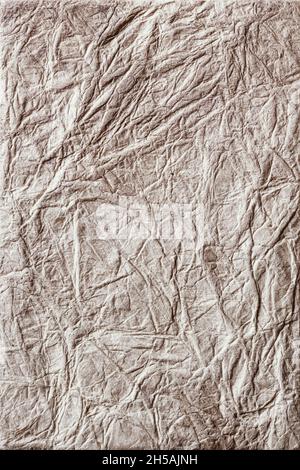 Textured gray wrinkled handmade paper background. Vertical background for design Stock Photo