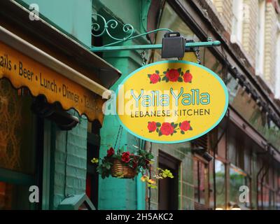 Sign above the Lebanese restaurant Yalla Yalla in London, UK Stock Photo