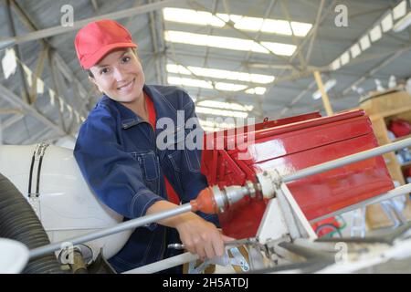 woman working in engineering of plane Stock Photo