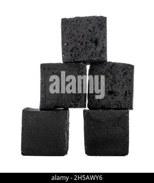 Group of charcoal cubes isolated on white background Stock Photo