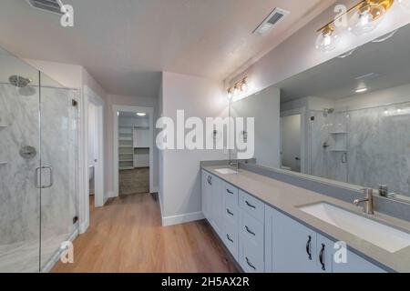 Luxurious bathroom interior with modern double vanity sinks and mirror Stock Photo