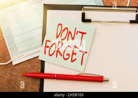 Hand writing sign Don T Forget. Word for used to remind someone about important fact or detail Writing Prescription Medicine Laboratory Testing And Stock Photo