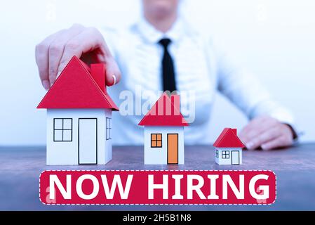 Conceptual caption Now Hiring. Word for finding evaluating working relationship with future employees Different plans for houses represented by Stock Photo