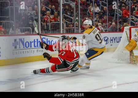 Chicago Blackhawks center Kirby Dach (77) and Colorado Avalanche