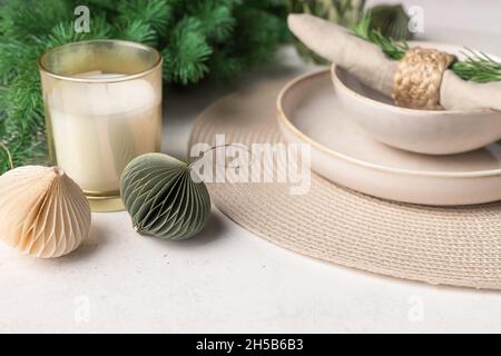 closeup Christmas festive table setting with tableware Stock Photo