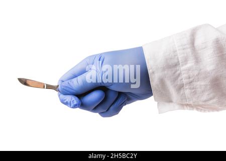 Surgeon hand holds a scalpel isolated on white background, template for designers Stock Photo