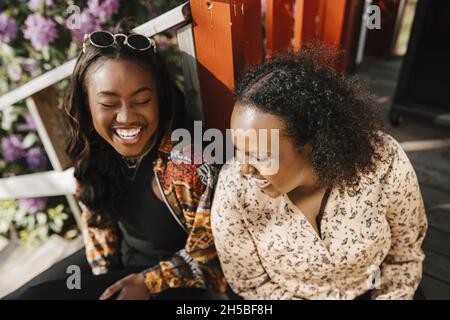 High angle view of cheerful female friends Stock Photo