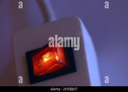 Kaufbeuren, Germany. 08th Nov, 2021. The circuit breaker of a multiple socket is lit up red. Households in Germany continue to pay comparatively much for electricity in a global comparison. Credit: Karl-Josef Hildenbrand/dpa/Alamy Live News Stock Photo