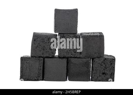 Group of charcoal cubes isolated on white background Stock Photo