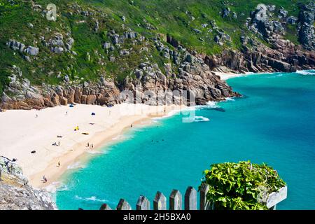 View of the turquoise waters of Porthcurno beach in Cornwall (England) on a beautiful summer day Stock Photo