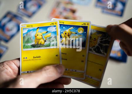 Bangkok, Thailand - January 27, 2021 : A man playing Pokemon Trading Card game. Stock Photo