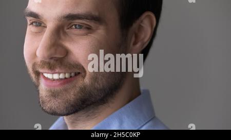 Close up confident handsome young man looking in distance. Stock Photo