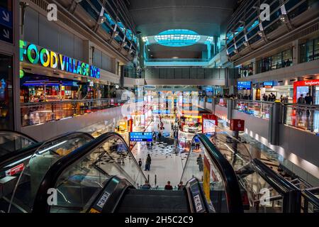 DUBAI, UAE - 06.11.2021: DXB airport interior. Duty free shops on the Dubai International Airport. High quality photo Stock Photo