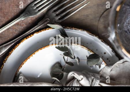 Rustic table setting with Easter eggs for Easter dinner Stock Photo