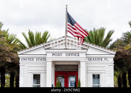 Seaside, USA - January 9, 2021: Town in Florida panhandle with Post Office sign in city town beach gulf of mexico, white architecture new urbanism and Stock Photo